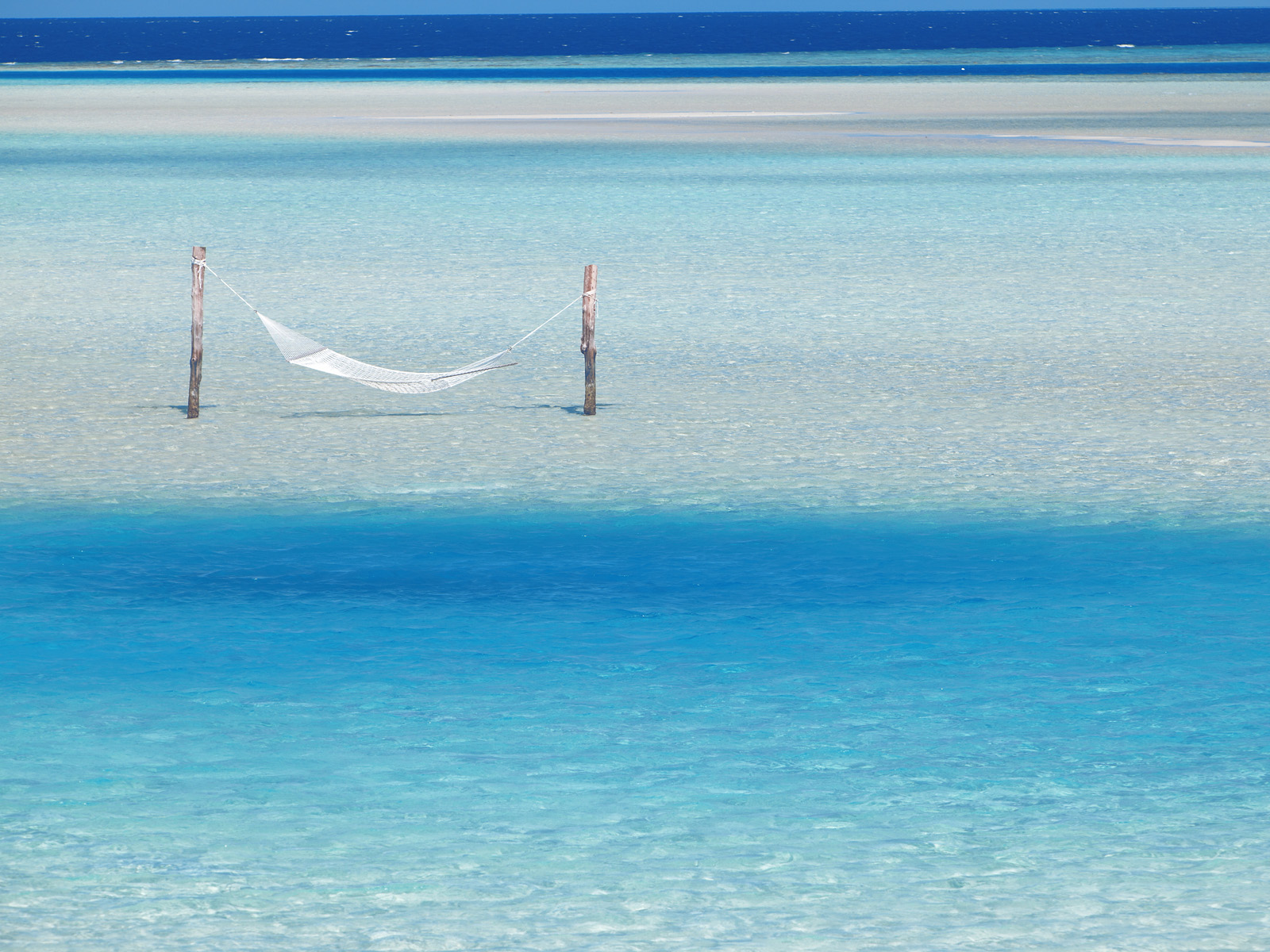 Hammock Hanging in Shallow Water, Maldives, Indian Ocean