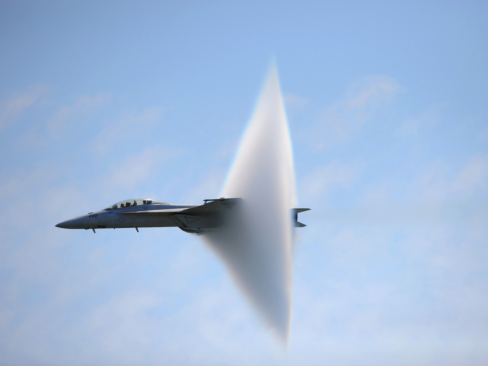 Water Vapor Ring Around a F_A-18F Super Hornet While Breaking The Sound Barrier